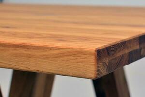 Wooden dinner table surface. Natural wood furniture close view photo