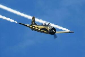 Old timer warbird at air base and airfield. Cold war and World War aviation. Airshow display. Aged military aircraft. Fly and flying. photo