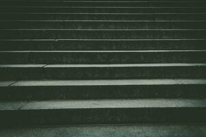 Abstract image of dark stairs in the light photo