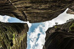 Spectacular view on the sky from in between the rocks photo