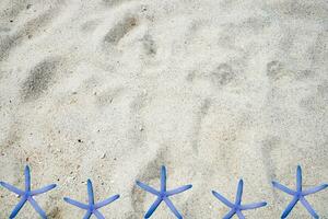 blanco arena sutil grano suave con estrella de mar foto