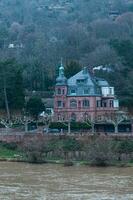 Heidelberg, Germany - Dec 26, 2018 - Old private house on the border of the river photo