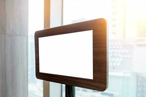 Tablet blank screen on table with the modern menu order photo