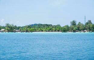 Blue sea with resort,most abundant coral reef at lipe island photo