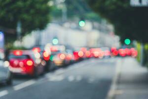 Defocused cars in the traffic jam during  the rush hour photo