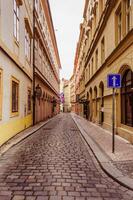 Prague, Czech Republic, - 17 Feb 2018 - Spectacular narrow street in the old part of the city photo