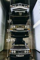 Munich, Germany - Aug 27, 2019 - BMW casrs on the rack in Munich Museum photo