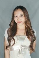 Curly wave iron hair, catok klintong, cute girl model Balinese Indonesian Asian, beauty salon photo