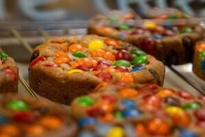 Rainbow candies as a cookie topping photo