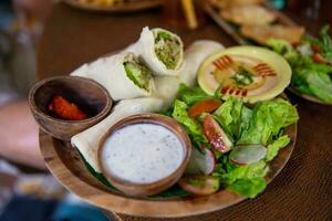 Chicken wrap with hummus photo