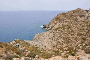 the view from the top of the cliff overlooking the ocean photo