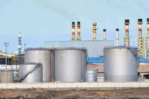 industrial plant with large tanks and pipes photo