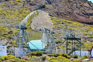 an observatory in the middle of a mountain photo