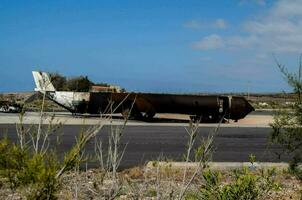 an airplane that is sitting on the ground photo