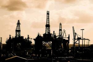 oil rigs in the sunset photo
