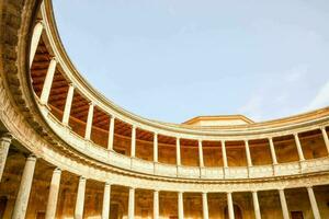 the circular courtyard of the alhambra palace in seville, spain photo