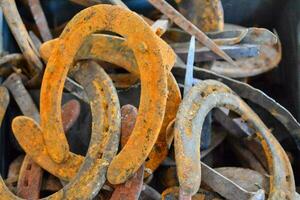 a pile of horseshoes photo