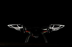 A drone isolated on black background photo