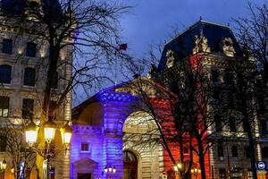 Buildings in the city with colorful lights photo