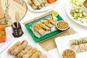 Traditional Vietnamese dish - Banh Cuon, Vietnamese steam rice rolls photo