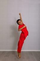 little boy child in red chinese dress, style and fashion ideas for children. chinese new year photo