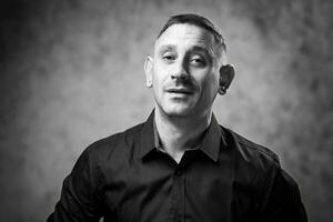 black and white portrait of a man in a shirt photo