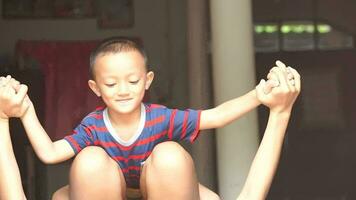 Mother and son playing together happily video