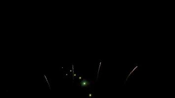 Amazing beautiful colorful firework display over sea on celebration night. Fireworks show for happy new year, 4k footage video