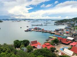 a view of a harbor with boats and houses photo