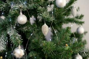 Christmas balls hanging on the Christmas tree photo