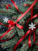 Photo Of Christmas Pine Tree Branches Draped With Red Ribbons And Snowflakes. AI Generated