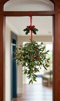 Photo Of Christmas Mistletoe Hanging From A Doorway. AI Generated