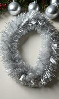 Photo Of Christmas Silver Tinsel Garland. AI Generated