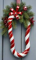 Photo Of Christmas Wreath Intertwined With Candy Cane Stripes And Tinsel. AI Generated