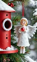 Photo Of Christmas Angel Ornament Beside A Snowy Birdhouse And Pine Tree. AI Generated