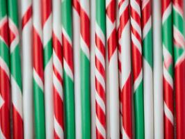 A Bunch Of Candy Canes With Green And Red Stripes. AI Generated photo