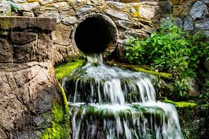 Photography on theme beautiful fall water from garden waterfall photo