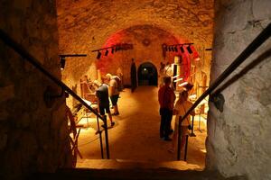 TERNOPIL, UKRAINE - AUGUST 23, 2023 The museum of tortures on territory of Zbarazh ancient castle in underground cellar photo