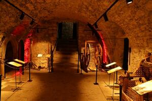 TERNOPIL, UKRAINE - AUGUST 23, 2023 The museum of tortures on territory of Zbarazh ancient castle in underground cellar photo