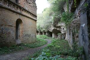 RIVNE, UKRAINE - SEPTEMBER 16, 2023 Ruins of the Tarakaniv Fort or Dubno Fort New Castle. Defense architectural monument of the 19th century photo