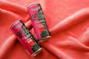 KYIV, UKRAINE - JULY 7, 2023 Coca-Cola zero sugar can with Rosalia design limited edition on red background photo