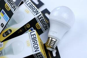 KHARKOV, UKRAINE - MARCH 30, 2021 Many Lebron LED light bulbs. Lebron is chinese light equipment manufacturer photo