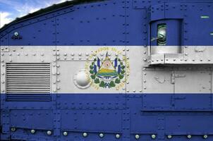 El Salvador flag depicted on side part of military armored tank closeup. Army forces conceptual background photo