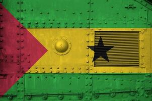 Sao Tome and Principe flag depicted on side part of military armored tank closeup. Army forces conceptual background photo