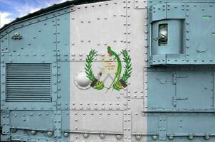 Guatemala flag depicted on side part of military armored tank closeup. Army forces conceptual background photo