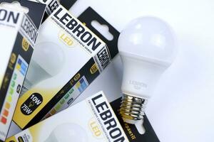 KHARKOV, UKRAINE - MARCH 30, 2021 Many Lebron LED light bulbs. Lebron is chinese light equipment manufacturer photo