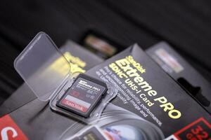 KHARKOV, UKRAINE - JANUARY 12, 2021 SanDisk Extreme pro sdhc 32gb new memory card for photo and video recording devices