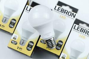 KHARKOV, UKRAINE - MARCH 30, 2021 Many Lebron LED light bulbs. Lebron is chinese light equipment manufacturer photo