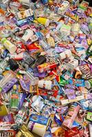 KHARKOV, UKRAINE - AUGUST 10, 2021 Big pile of various wrappings and empty disposable packages and cups from famous branded food production photo
