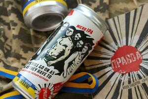 KYIV, UKRAINE - MAY 4, 2022 Localy brewed beer called Fights will go on as long as they have to photo